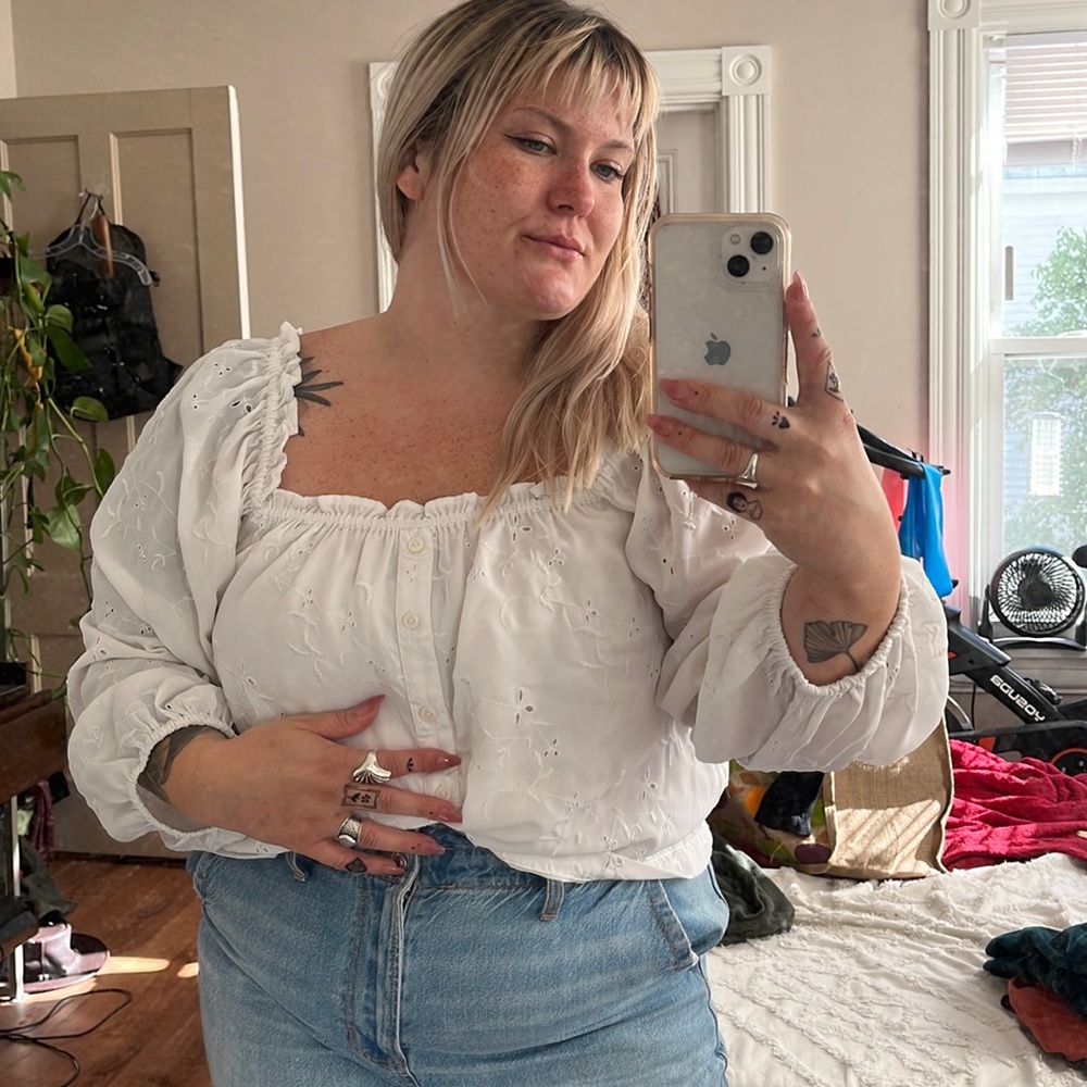 white embroidered ruffle off the shoulder top